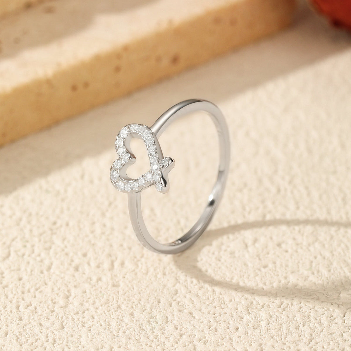 Irregular Heart-Shaped D-Color VVS1 Moissanite Engagement Ring in Sterling Silver
