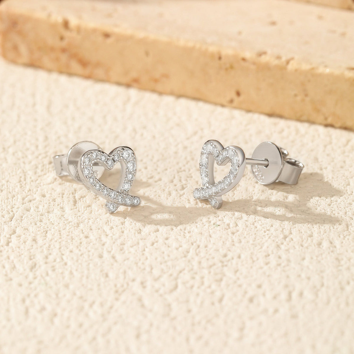 Asymmetrical Heart Stud Earrings in Sterling Silver with D-Color VVS1 Moissanite Accents