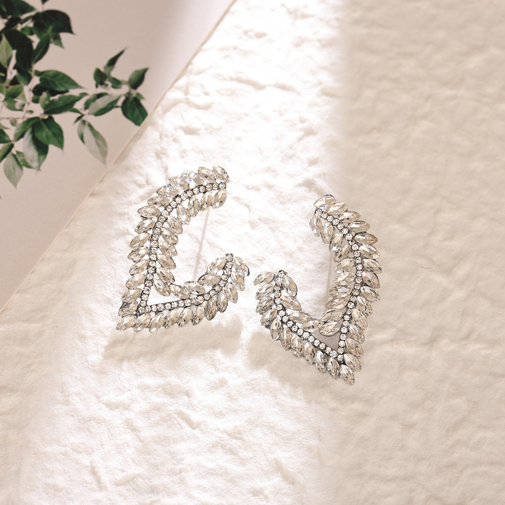 European American Light Luxury Marquise Rhinestone Earrings Exaggerated Banquet Gown Ear Jewelry High End Colored Crystal Alloy Stud Earrings For Women Wholesale