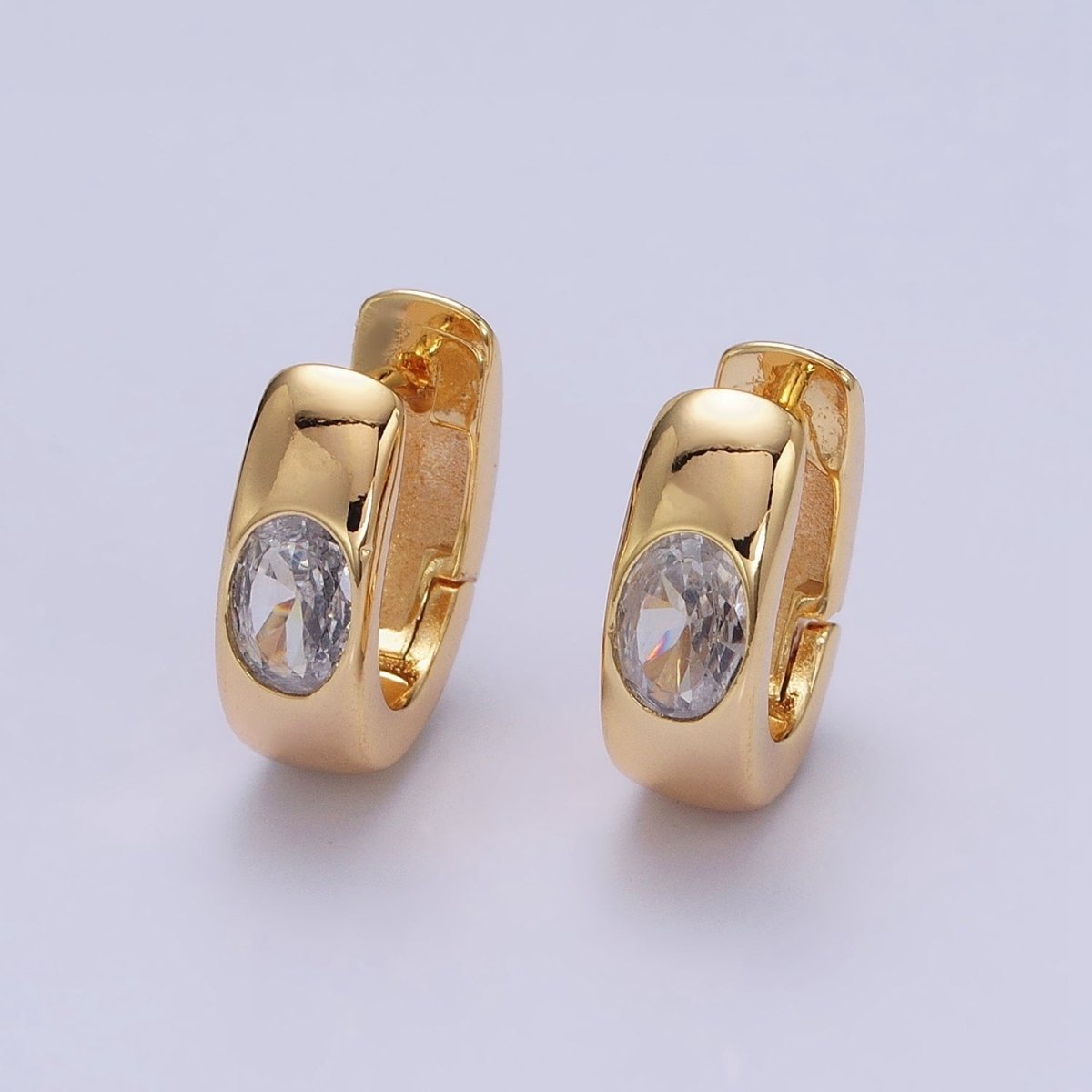 16K Gold Filled Clear Oval CZ 15mm Thick Huggie Earrings in Gold & Silver | AD891 AD892