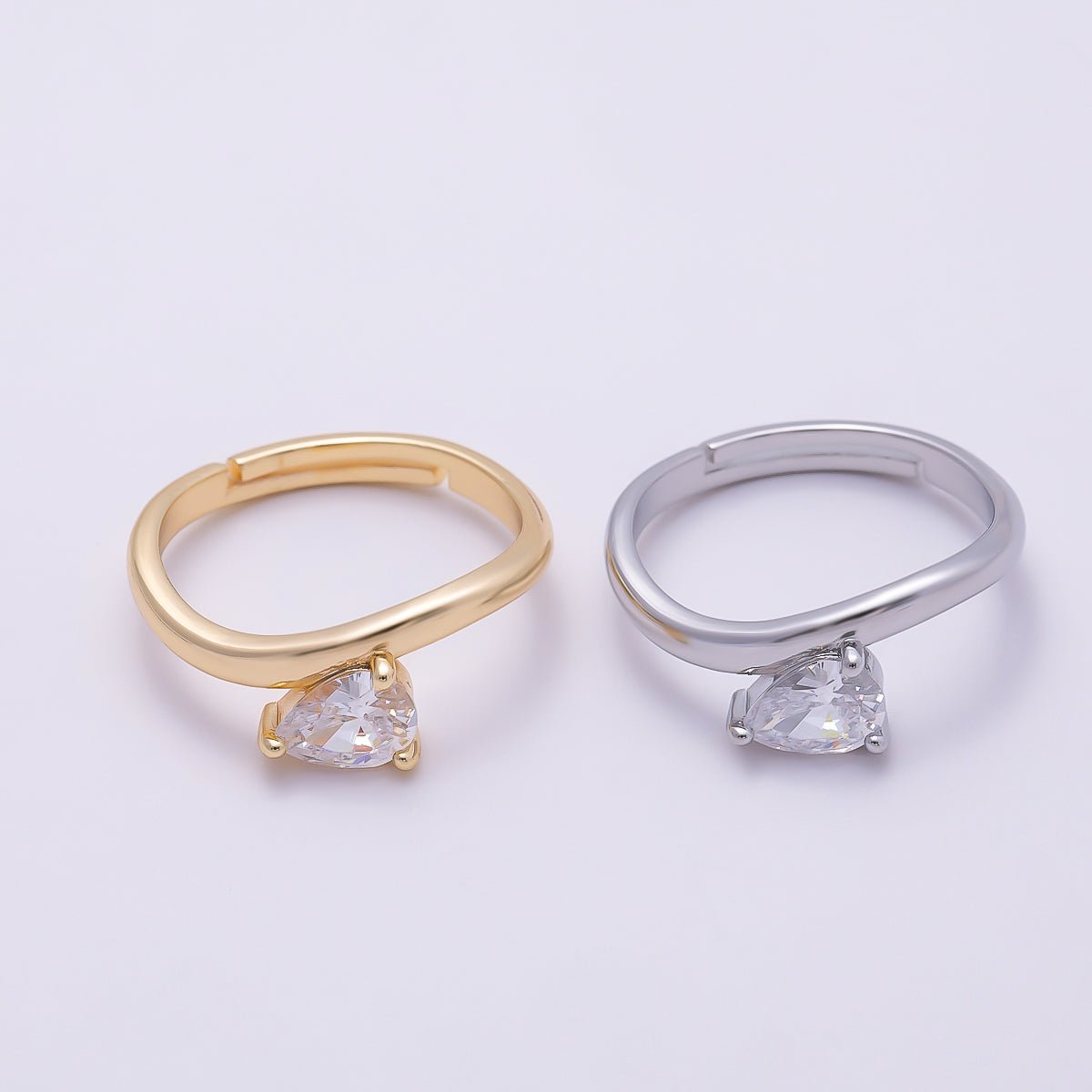 16K Gold Filled Clear Teardrop CZ Solitaire Curved Ring in Gold & Silver | Rings-00130 Rings-00131