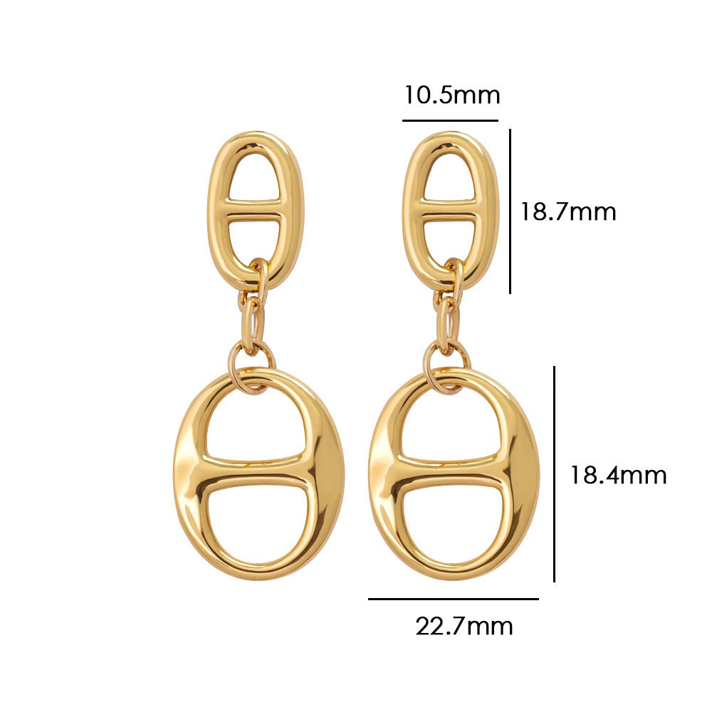 18K gold geometric-shaped necklace, bracelet, and earrings set.