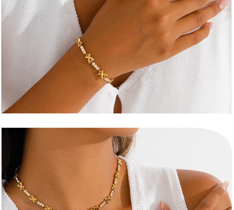 X-shaped Diamond-studded Necklace Set For Ladies - Luxurious And High-end, Featuring A Sparkling Array Of Diamonds And A Stainless Steel Bracelet Accessory.