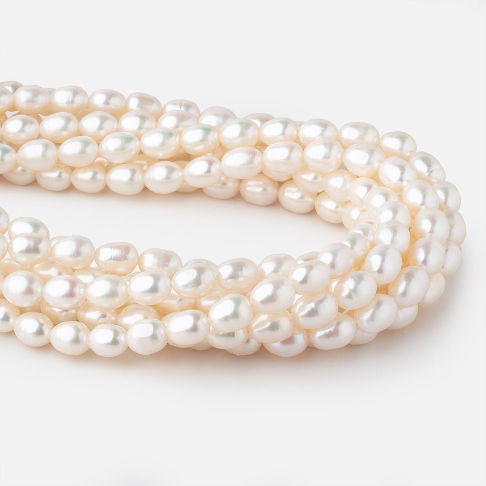 7x9-8x10mm Cream Straight Drilled Oval Freshwater Pearls 15 inch 40 pieces