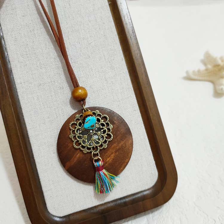Women's Ethnic Retro Tassel Round Leaves Hollow Out Necklace