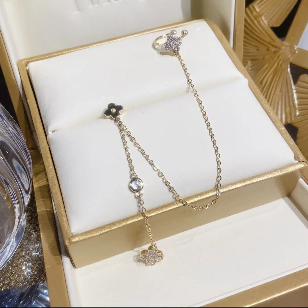 Four-leaf Flower Zircon Drawable Female Hollow Design Sense Exquisite Refined Bracelet