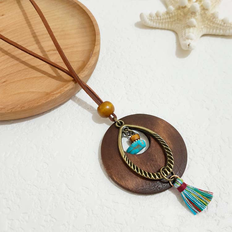 Women's Ethnic Retro Tassel Round Leaves Hollow Out Necklace