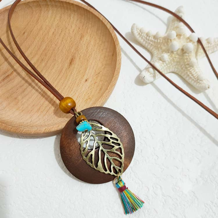 Women's Ethnic Retro Tassel Round Leaves Hollow Out Necklace
