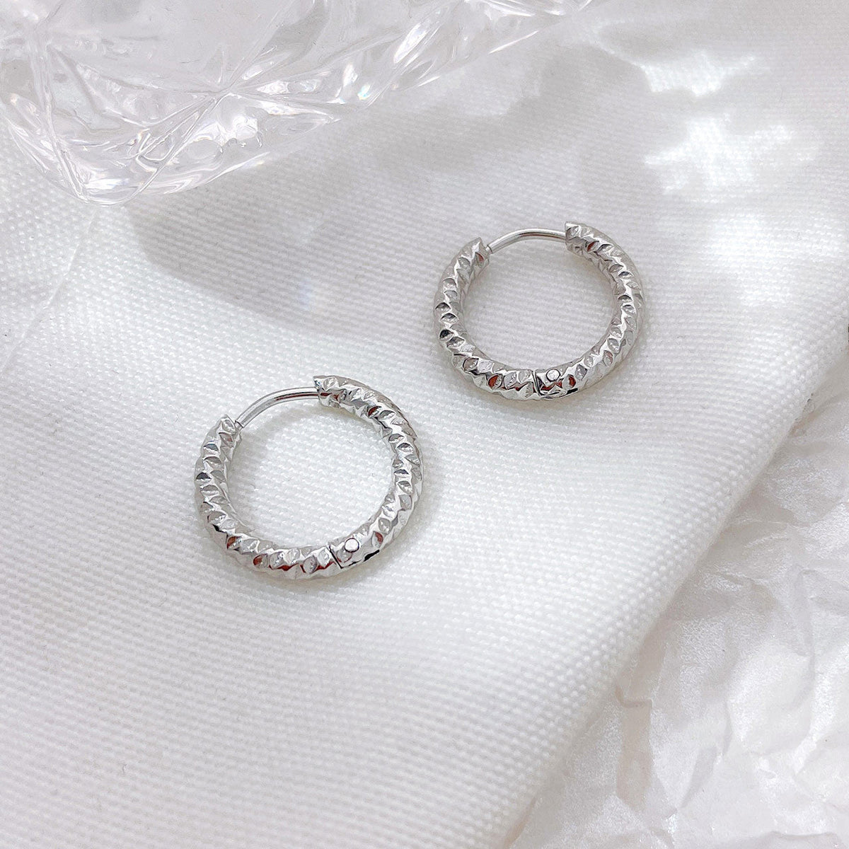 Stainless Steel Circle Ear Clip Cold Wind Embossed Niche Titanium Earrings