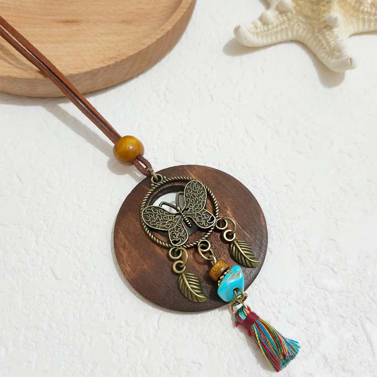 Women's Ethnic Retro Tassel Round Leaves Hollow Out Necklace