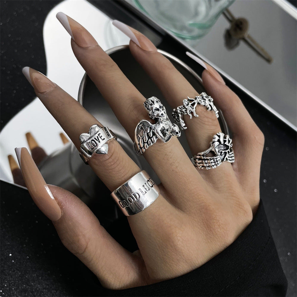 Alloy Chain Vintage Crying Face Poker Hollow Love Ring
