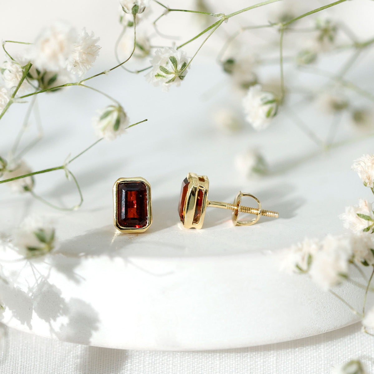 1.4 CT Emerald Cut Garnet Solitaire Stud Earrings in Bezel Setting