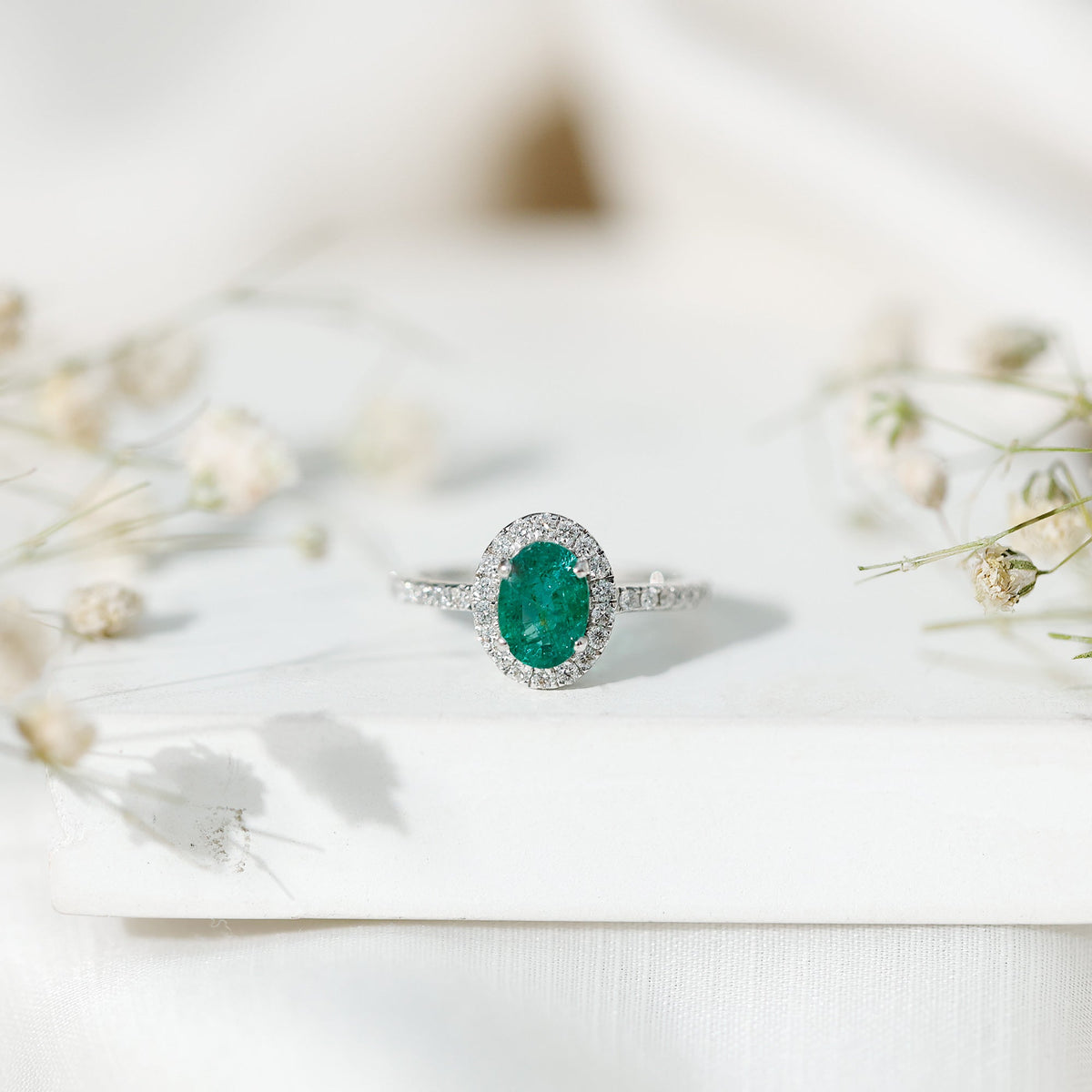 Real 0.7 Carat Oval Emerald Engagement Ring with Diamond Halo