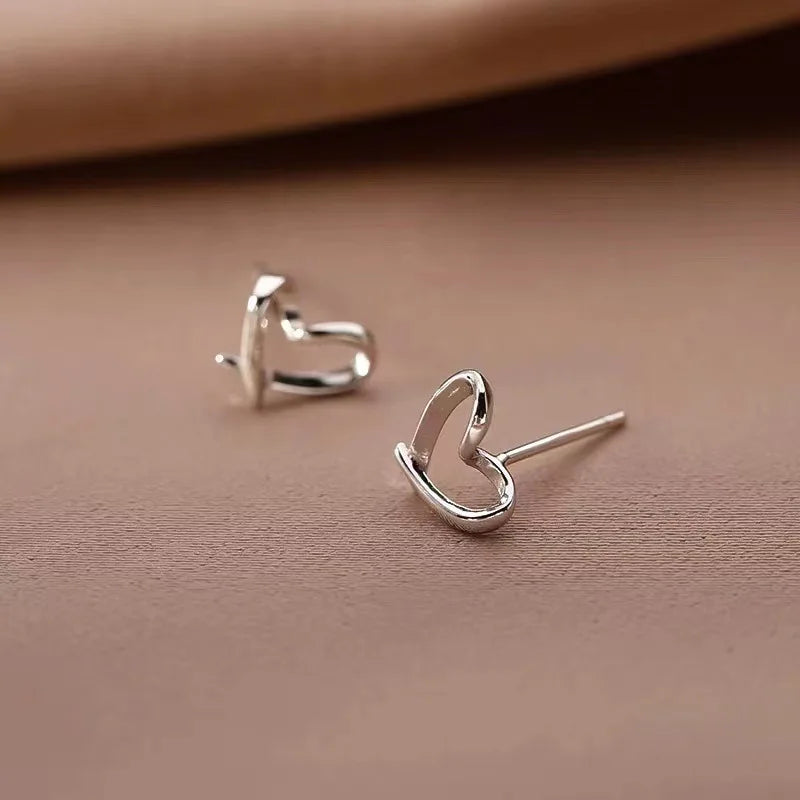 S925Silver Hollow out heart-shaped earrings for women, simple, light, luxurious, high-end, heart-shaped ins, high-end