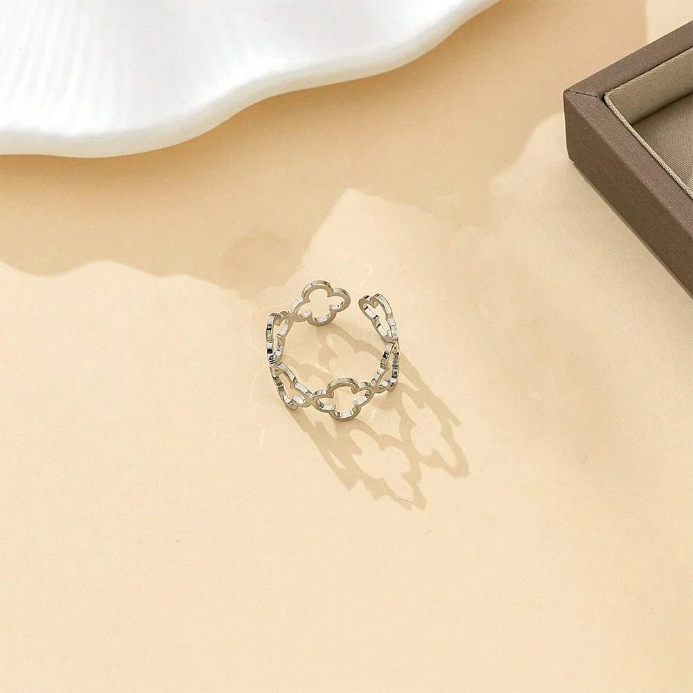 DOTIF Stainless Steel Lucky Hollow Four-Leaf Clover Ring Female Fashion Simple Opening Adjustable Finger Jewelry Party Gifts