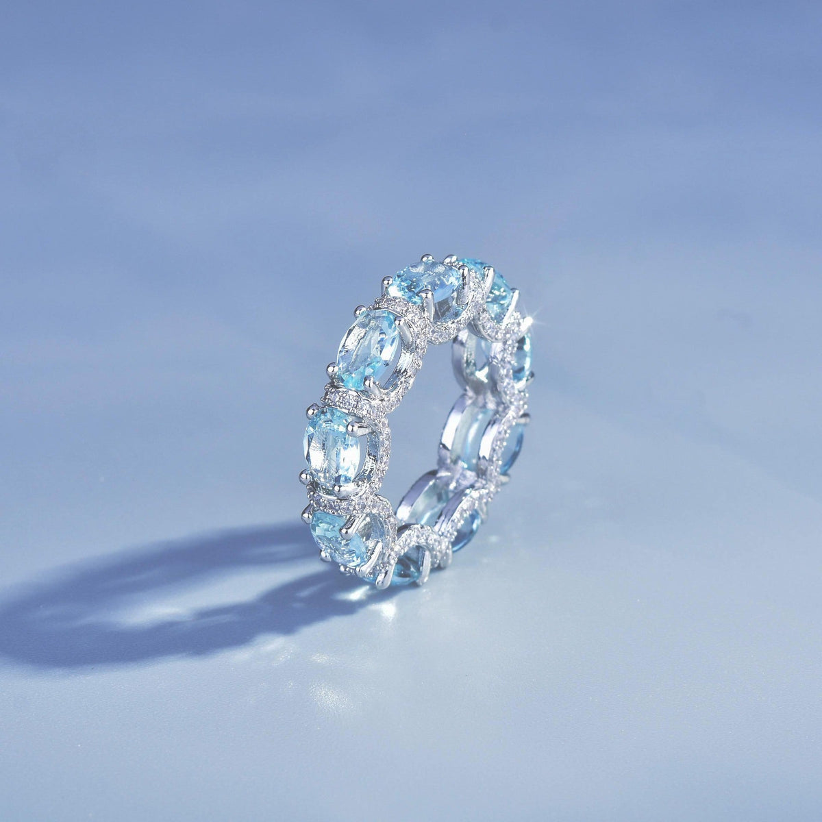 Luxury Oval Cut Aquamarine Eternity Band Ring, Micro Pave Blue Gemstone Stackable Ring For Women