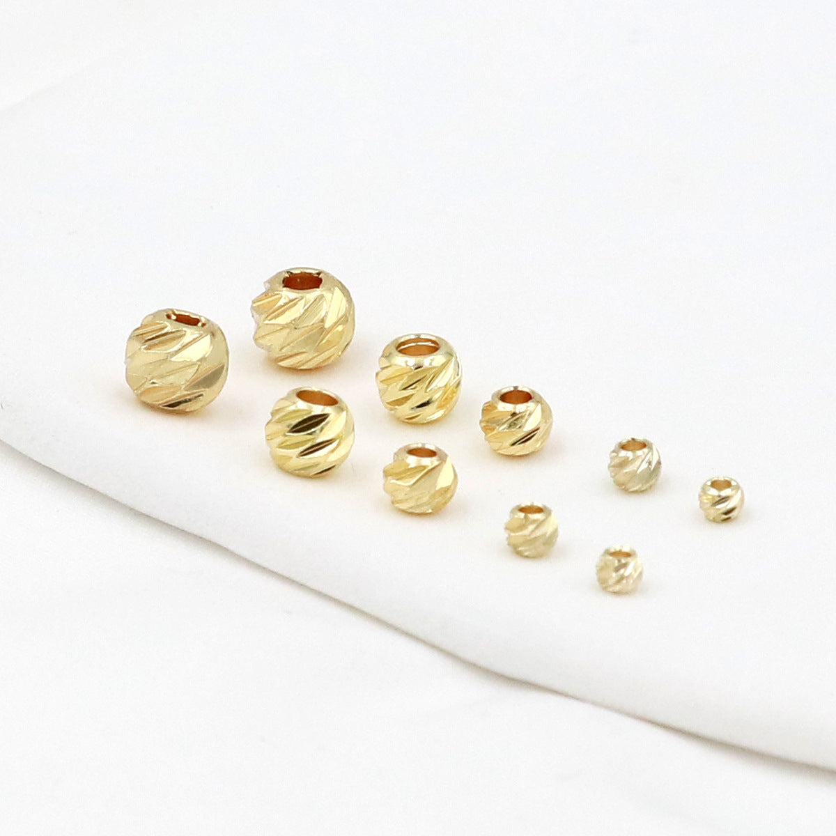 Copper-plated 18K Gold Beveled-cut Filigree Round Spacer Beads