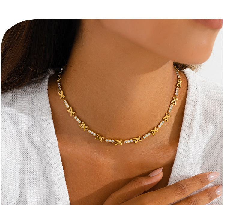 X-shaped Diamond-studded Necklace Set For Ladies - Luxurious And High-end, Featuring A Sparkling Array Of Diamonds And A Stainless Steel Bracelet Accessory.