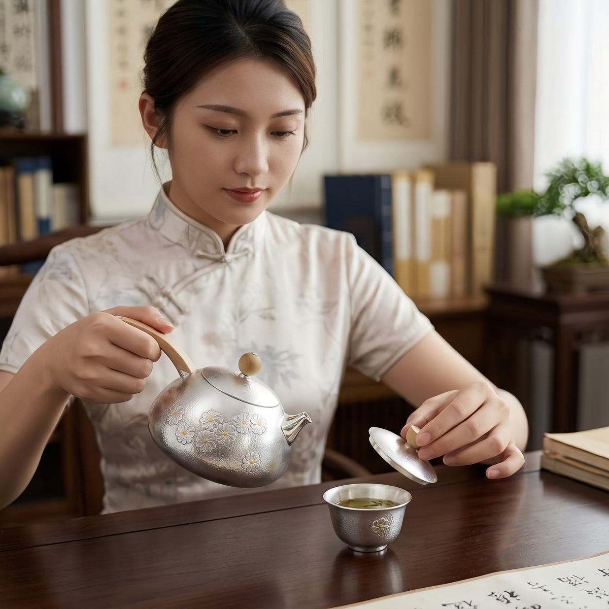 Pure 999 Fine Silver Hand-Hammered Silver Teapot with Delicate Floral Engravings and Sandalwood Handle - Handicraft