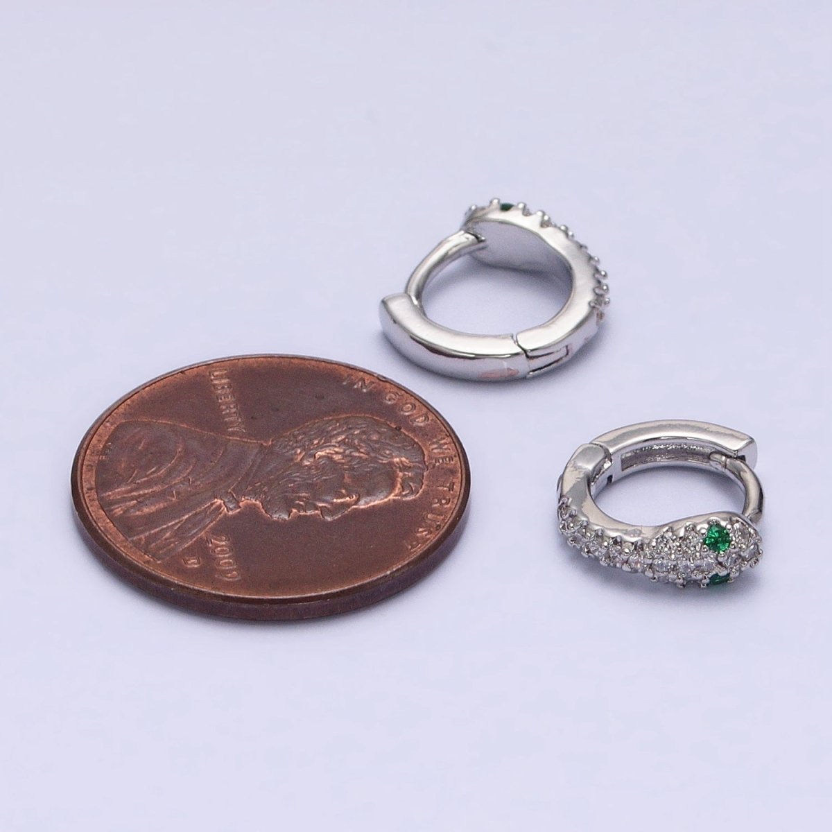White Gold-Filled Green-Eyed Micro Paved 10mm Cartilage Huggie Earrings | AB1547